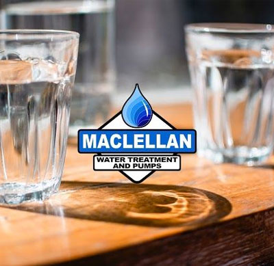 glasses of water with Maclellan logo in centre